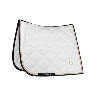 A white dressage saddle pad with rose golden details and the Mrs. Ros logo embroidered.