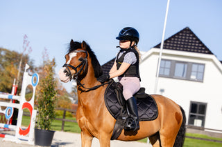 Riding breeches for kids in light pink, with Mr.Ros logo