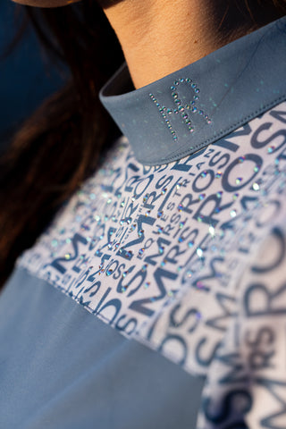 Close up of the Mesh Logo Long Sleeve Top  with diamonds.