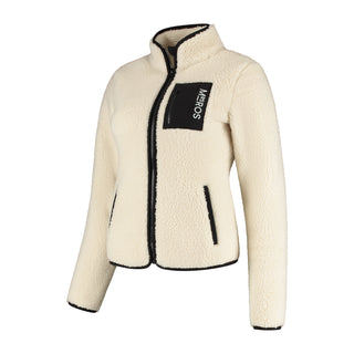 A cozy white jacket in teddy fabric and black details