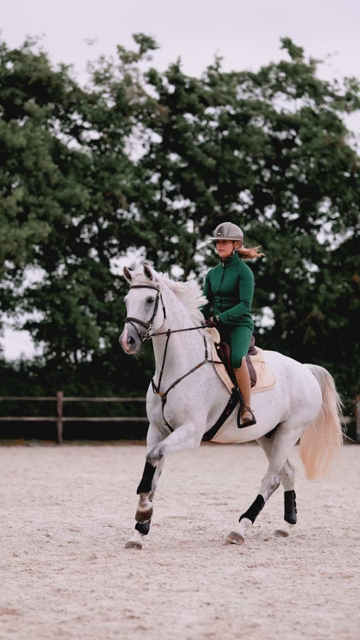 Dark Forest riding jacket and breeches in motion
